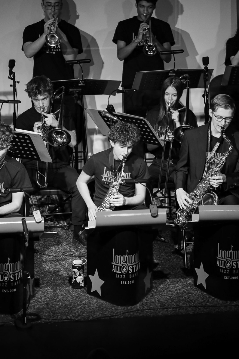 black and white image of Longmont All Star Jazz band saxophone section